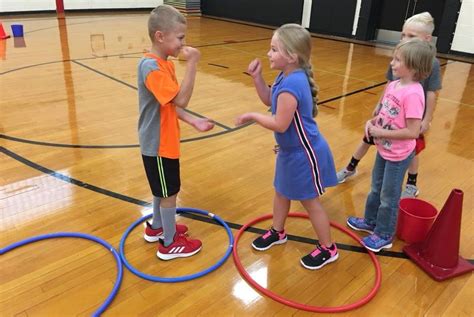 Hoop Hop Showdown - Rock Paper Scissors Hula Hoop Activity - S&S Blog | Gym games for kids, Hula ...