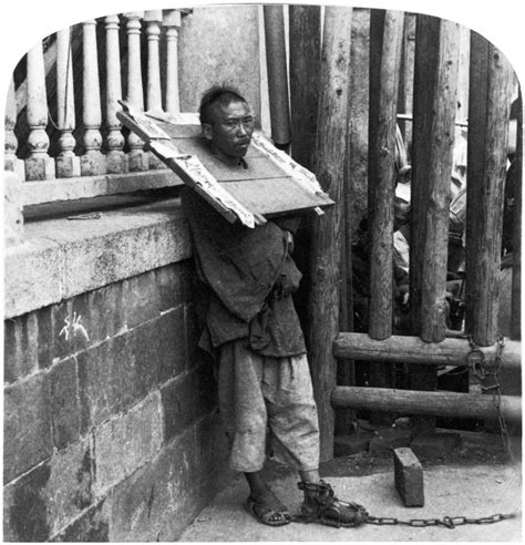 China Punishment C1900 Na Criminal In China Chained By The Ankle To A Fence And Locked In A ...