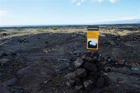 Tsunami Warning Sign In Coastal Photograph by Joshua Rainey - Fine Art ...