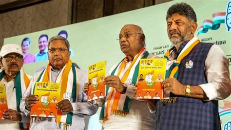 Congress unveils K'taka manifesto, promises ₹2k/month to woman head of ...