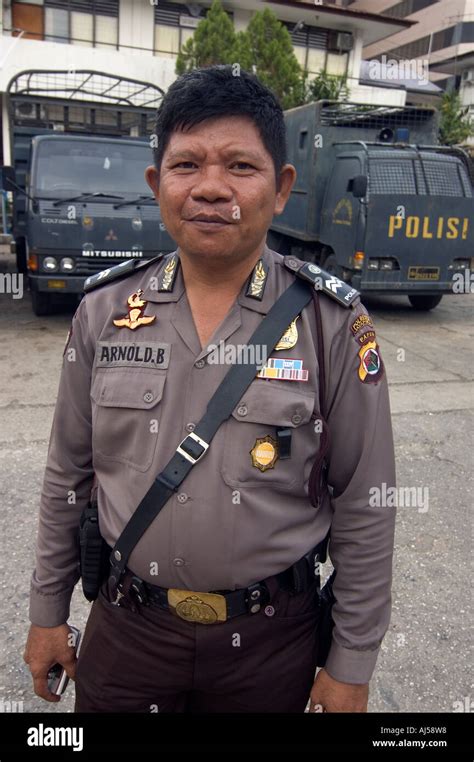 Portrait of an Indonesian police officer in Jayapura, with anti-riot ...