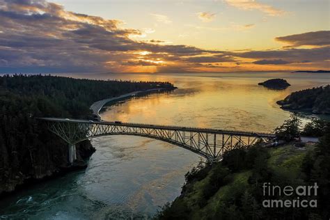 Over the Deception Pass Bridge Sunset Skies Photograph by Mike Reid