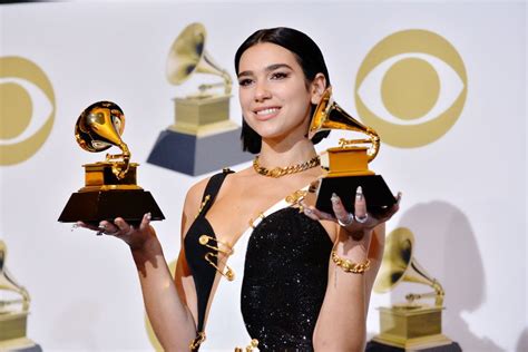 LOS ANGELES, CALIFORNIA - FEBRUARY 10: Dua Lipa attends the 61st Annual GRAMMY Awards - Press ...