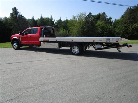 2023 Ford F-550 4x4 Extended Cab Jerr-Dan 20' Aluminum Lo-Profile Rollback | Nussbaum Equipment