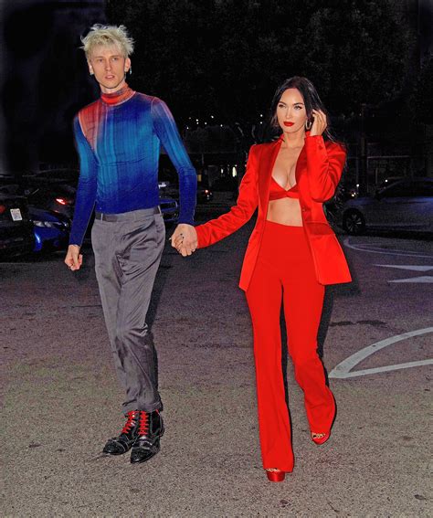 Megan Fox sizzles in red suit and bra with Machine Gun Kelly