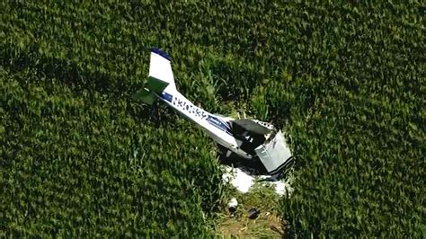 Small plane crashes with 2 onboard in field near suburban airport: FAA ...