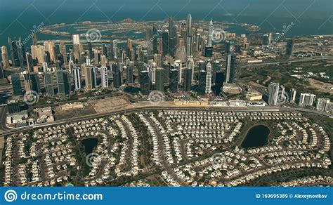 Aerial View of Luxury Villas, Dubai Marina Skyscrapers and the Palm Jumeirah Island in Dubai ...