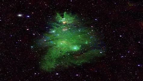 Nasa discovers 'Christmas Tree Cluster' sparkling in cosmic emerald glory