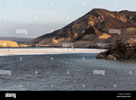 Africa, Djibouti, Lake Assal. Landscape view of lake Assal with people ...