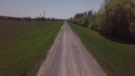 Drone flying low above a road in 4K 1790261 Stock Video at Vecteezy