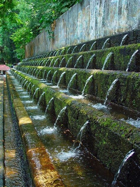 the water is running down the side of the wall