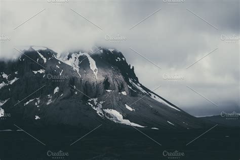 Low Clouds over Dark Mountain Range | High-Quality Nature Stock Photos ~ Creative Market