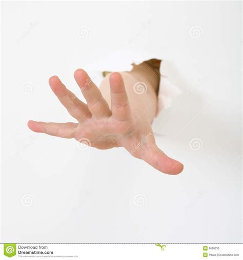 Child's Hand Stick Out From Hole Stock Photos - Image: 9068333