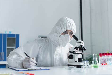 Scientist in Hazmat Suit Looking in Stock Image - Image of disease ...