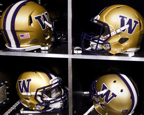 Washington Huskies Football Helmets Photograph by Replay Photos