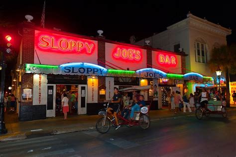 Pedicab passing in front of Sloppy Joe's Bar, Duval Street, Key West, Florida Keys, Florida ...
