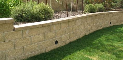 Installing Weep Holes In Retaining Wall (Easy Way) | Landscaping ...