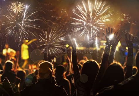 New Year Concept - Cheering Crowd And Fireworks Stock Image - Image of cheers, celebration ...