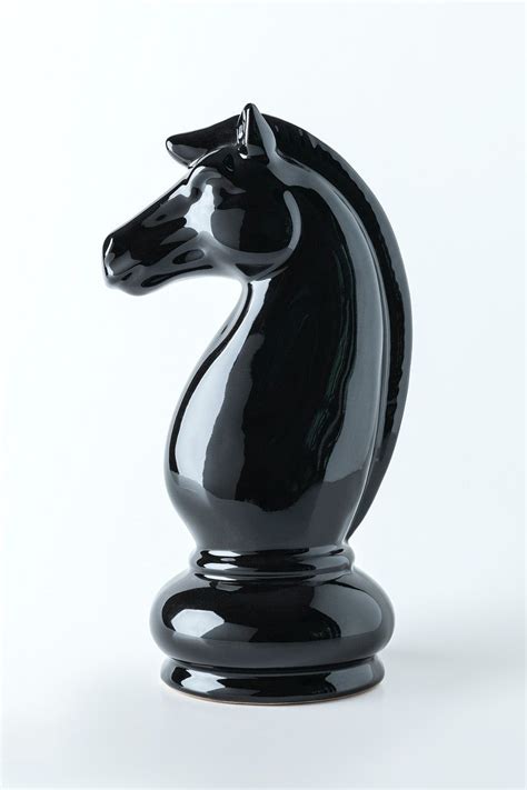 Download free image of Shiny black knight chess piece on off white ...