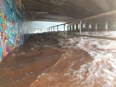 Monsoon rain causes widespread flash flooding across Cairns and surrounds