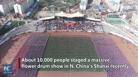 Grand scene of 10,000 people beating flower drums in N. China's Shanxi ...