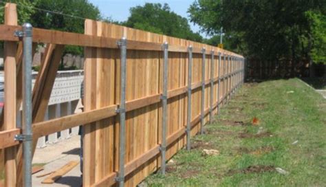 Privacy Fence Ideas - Huge curved latticework panels encased in block columns with a wood beam ...