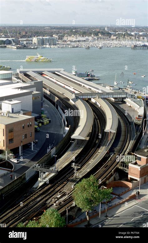 Portsmouth Harbour rail station from the air with the dockyard and the Solent ferry in the ...