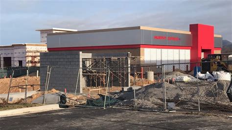 What's being built beside Walmart on Airport Road?