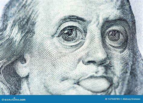 Big Eyes of Benjamin Franklin with a Hundred Dollar Bill, a Symbol of Inflation, Appreciation ...