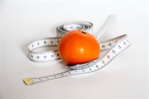 Tape measure and tangerine free image download
