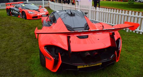 Matching McLaren P1 GTR And F1 GTR Light Up Goodwood In Fluro Orange