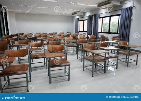 Empty School Classroom with Many Wooden Chairs. Wooden Chairs in Classroom. Empty Classroom with ...