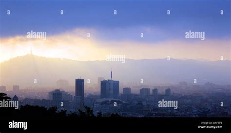 Barcelona Skyline at Sunrise Stock Photo - Alamy