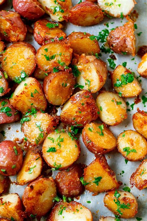 Roasted Garlic Butter Parmesan Potatoes | Potato side dishes, Parmesan potato recipe, Food dishes