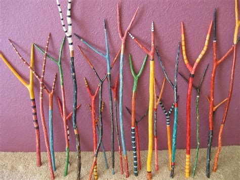 painted sticks- what a fun idea. Imagine an installation of these at ...