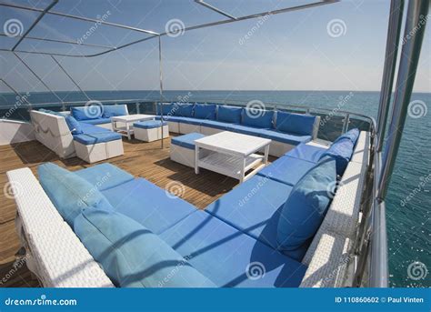 Table and Chairs on Deck of a Luxury Motor Yacht Stock Photo - Image of ...