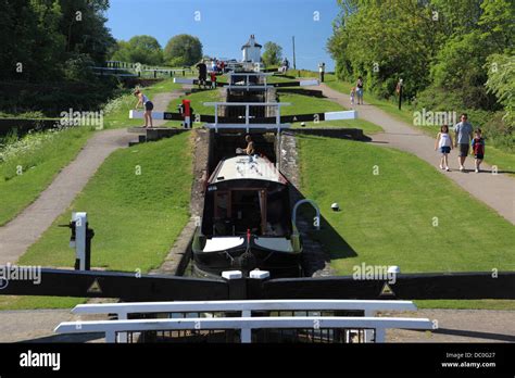 A narrowboat descending Foxton Locks, on the Grand Union Canal, the largest flight of staircase ...