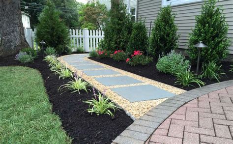 Bluestone stepping stone walkway over pea gravel | Backyard walkway, Stone walkway, Walkway ...