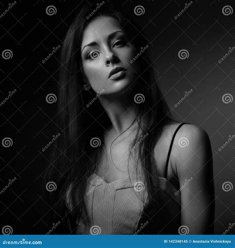 Beautiful Makeup Seriois Woman with Long Hair Looking with Half Shadow ...