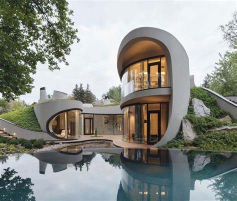 Futuristic Organically Shaped Home Balances Architectural and Natural ...