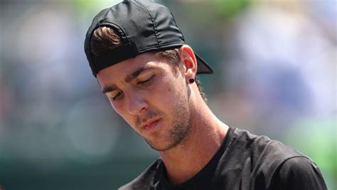 Thanasi Kokkinakis injury: Australian hurts knee after tripping over ...