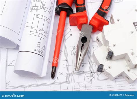 Rolled Electrical Diagrams, Electric Fuse And Work Tools On Construction Drawing Of House Stock ...