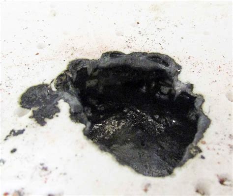 metal - What is the black slag formed when sterling silver is melted with borax? [Edited with ...
