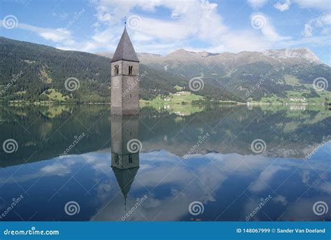 Church Bell Tower Reflecting in Lake Resia, Italy. Stock Image - Image of reflecting, lake ...