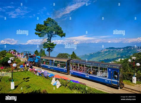 India, West Bengal, Darjeeling, the toy train from Darjeeling Himalayan Railway at Batasia Loop ...