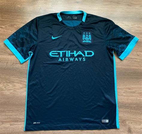 Manchester City Away football shirt 2015 - 2016. Sponsored by Etihad