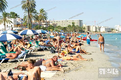 People at Bora-Bora beach, Platja d'en Bossa. Ibiza, Balearic Islands ...