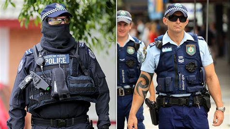 AFP Police officers forced to hide tattoos under new uniform rules | Daily Telegraph