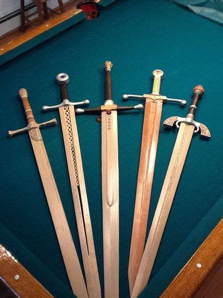 Handcarved Wooden Swords (Too involved for school, but nice design ideas for the handles ...