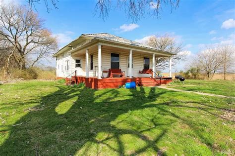 Farmhouse w/ country views and 11 acres of farm land. $169,900 – Adorable Living Spaces